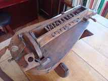 May be an image of musical instrument and text